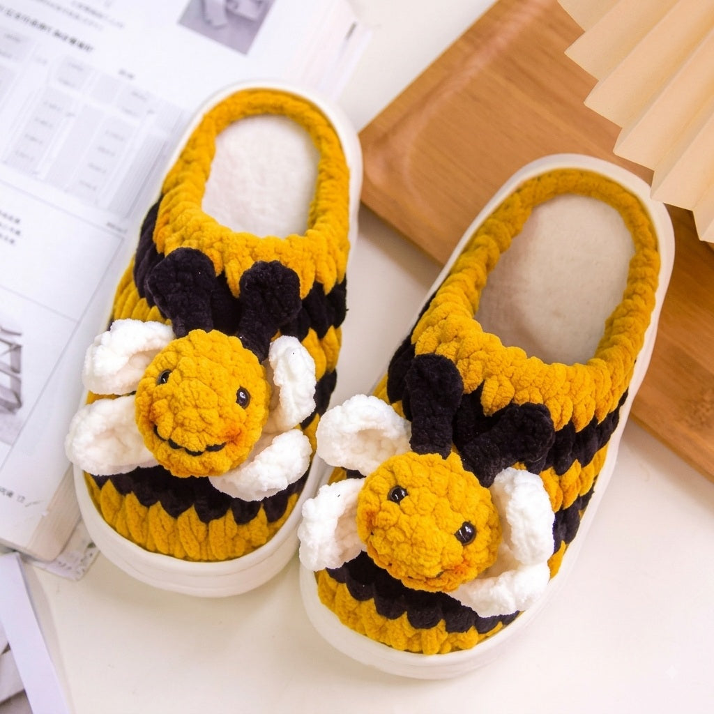 Finished hand-crocheted kids bumblebee winter slippers crafted using plush EVA slipper soles.