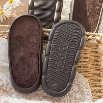 Kids dark brown EVA shoe bases with cozy fleece plush lining for handmade DIY house shoes.