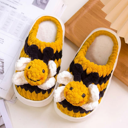 Finished hand-crocheted kids bumblebee winter slippers crafted using plush EVA slipper soles.